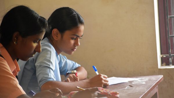 pupils write PTE and IELTS Exam